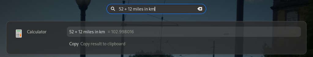GNOME Shell search result for "52 + 12 miles in km"